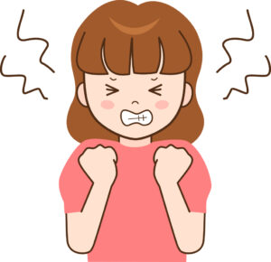 歯ぎしりをする女性